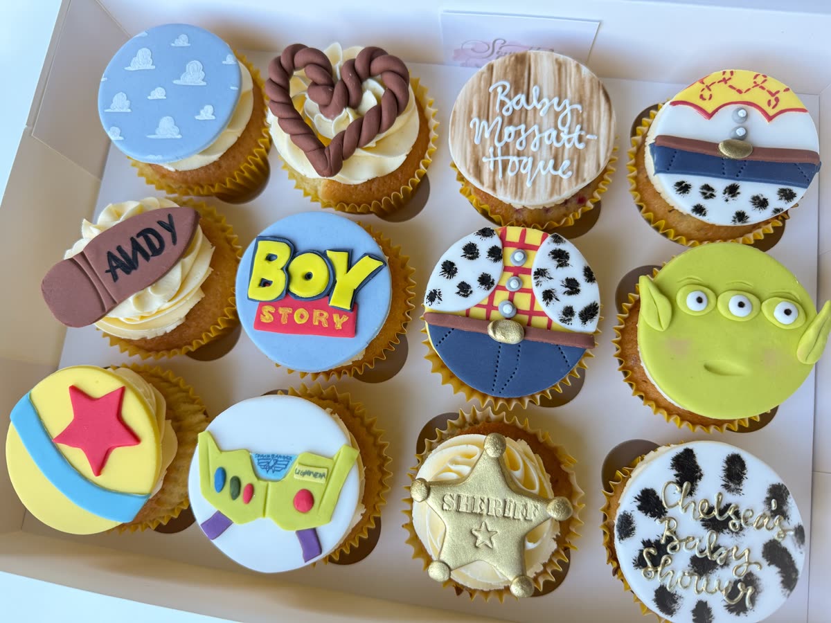 Box of twelve Toy Story themed cupcakes with hand-made fondant toppers